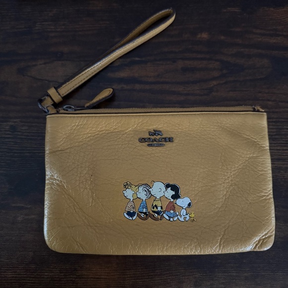 Coach Peanuts Wristlet in Mustard Yellow - Picture 1 of 6